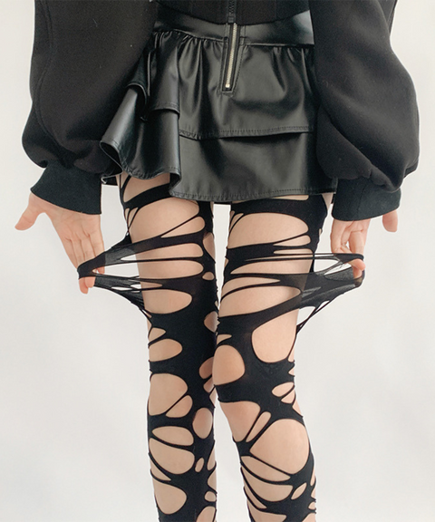 Gothic ripped fishnet stockings