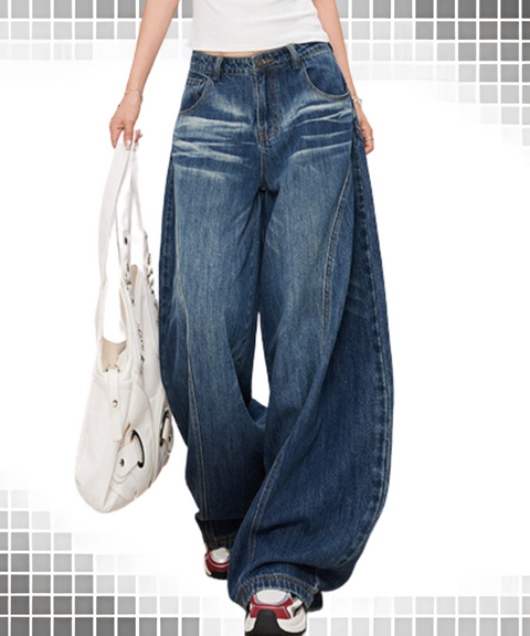 Baggy scimitar-style dark
vintage coloured washed jeans