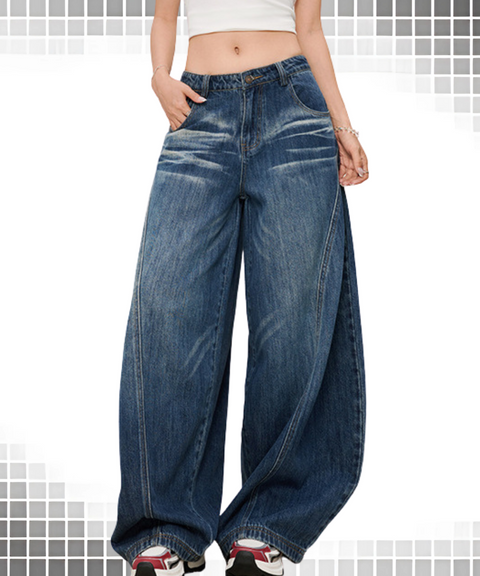 Baggy scimitar-style dark
vintage coloured washed jeans