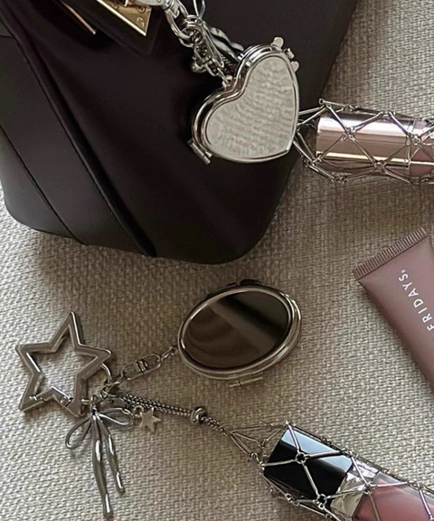 High-end silver lipstick holder bag charm with a built-in makeup mirror