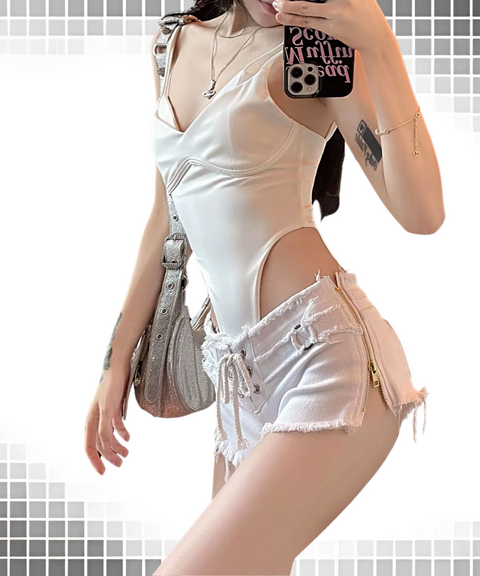 Low-Rise Zippered Distressed Denim Shorts